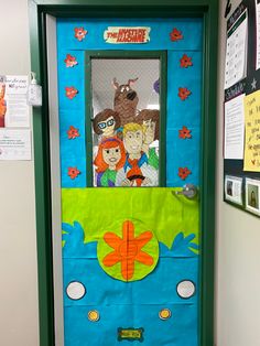 a door decorated to look like a school bus with cartoon characters on the front and side