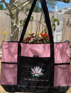 "Bring some ZEN into your daily life or the life of someone special with this Lotus Flower Tote Bag. Colored- side pocket bag (Pink, Blue, Black, Green, Turquoise, Red, Purple) Features: § 600-denier polyester § 29½\" Black webbing shoulder straps § Zippered main compartment § Front pocket with pen loop § Two side mesh pockets § Back panel is Black § 20\"W x 14\"H x 4\"D Designed to be multi-purpose and functional these tote bags are perfect for a laptop or tablet, a change of clothes or to use Flower Tote Bag, Flower Tote, Pocket Bag, Second Child, Green Turquoise, Custom Bags, Side Pocket, Red Purple, Lotus Flower