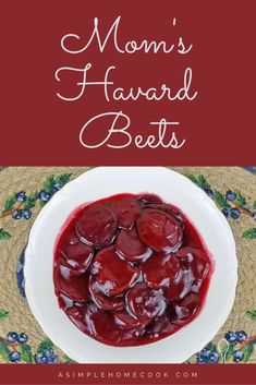 a white bowl filled with beets and the words mom's harvard beets