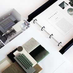 an aerial view of a living room and dining room area with various materials on the floor