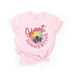 Looking for a cute versatile top to wear? Make sure to grab one of our Graphic tees! This soft and comfortable graphic tee is the perfect top for any outfit. It can be paired with biker shorts, jeans, or even a simple skirt/dress! This tee is true-to-size, so be sure to order your regular t-shirt size! If you are looking for a more oversized look, make sure to size up! Sweet Summer T-shirt With Crew Neck, Sweet Summer T-shirt With Graphic Print, Sweet Graphic Print T-shirt For Summer, Summer Sweet T-shirt With Letter Print, Sweet Summer T-shirt With Letter Print, Trending Graphic Tees, Simple Skirt, Casual Outfits For Teens, Sweet Summer