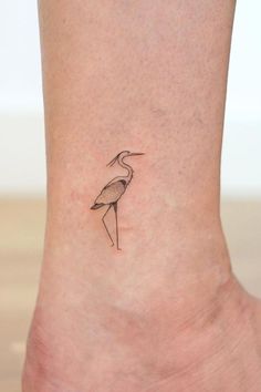 37 Jaw-Dropping Blue Heron Tattoo Designs For 2024 Snowy Egret Tattoo, Egret Tattoo Design, Blue Heron Tattoos, Heron Tattoo Simple, Herron Tattoo, Path Tattoo, Blue Heron Tattoo, Loon Tattoo, Pelican Tattoo