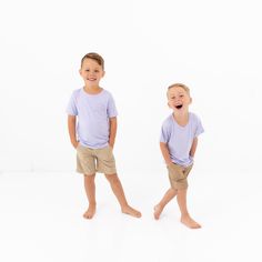 This essential tee is a staple for every toddler wardrobe. A V-neckline adds casual style to any outfit, while the stretchy, breathable material keeps little ones cool all day on the playground. Buttery soft to the touch, this tee is extra gentle even on the most sensitive skin. Match it to the Women's Relaxed Fit V-Neck for the perfect Mommy & Me outfits! 97% Rayon made from Bamboo, 3% Spandex V neckline Relaxed fit Basic T-shirt For Summer Playtime, Casual Solid Tops For Playtime, Family Matching Solid Color Short Sleeve Tops, Family Matching Short Sleeve Tops, Playful Short Sleeve Top, Playful Solid Color Tops For Playwear, Toddler Wardrobe, Mommy Me Outfits, Mommy And Me Outfits