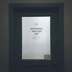 a sign is posted on the door of a building that says, 34 - 1 behavoial analsy unit