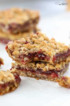 three pieces of fruit and oatmeal bars stacked on top of each other