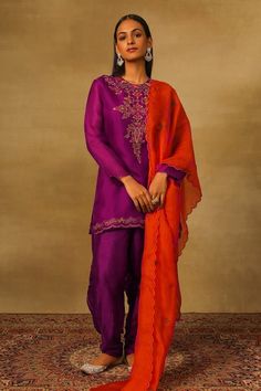 Purple straight kurta with floral embroidery using thread work, dabka, bullion and coins. Paired with a pleated pant and scallop trimmed rust dupatta. - Aza Fashions Embroidered Purple Sharara, Silk Palazzo Set With Floral Embroidery, Transitional Embroidered Silk Thread Fabric, Elegant Silk Thread Salwar Kameez, Fitted Silk Sharara With Embroidered Border, Silk Fitted Sharara With Embroidered Border, Intricate Embroidery Palazzo Set In Raw Silk, Purple Sets With Floral Embroidery, Purple Embroidered Fabric For Eid