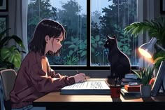 a woman sitting at a desk writing in front of a cat