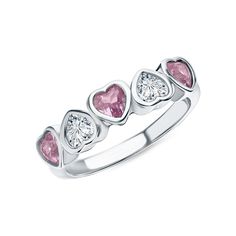 a pink and white diamond ring with three hearts on the band, set in 18k white gold