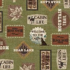 a green background with brown and white labels on it's sides, including the words cabin life welcome to the cabin