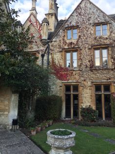 an old stone building with a clock tower