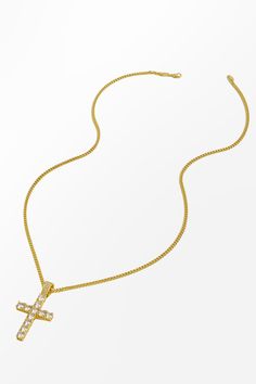 Make a divine statement with our Gold-Tone & Rhinestone Cross Pendant Necklace. The gold-tone finish adds a luxurious allure, while the rhinestone detailing adds a subtle shimmer. Perfect for adding a touch of sophistication to any outfit, this necklace is a must-have accessory for both day and evening wear. Product code: CAC01E4D007NN Features:  Material: 100%COPPER. Gold Cubic Zirconia Pendant Cross Necklace, Gold Cubic Zirconia Cross Pendant Necklace, Gold Cross Necklace With Cubic Zirconia, Crystal Rhinestone Cross Pendant Jewelry, Crystal Cross Pendant Jewelry With Rhinestones, Crystal Cross Pendant With Rhinestones, Gold Crystal Rhinestone Cross Pendant Necklace, Gold Rhinestone Necklace With Clavicle Chain, Gold Rhinestone Necklace With Gold Chain For Gift