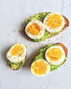 avocado toast with hard boiled eggs on top