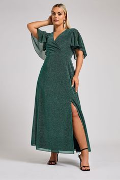 Make a statement at your next event with our London Metalic Wrap Maxi Dress. This stunning dress features a beautiful green color and is made from 100% polyester for a comfortable and luxurious feel. Perfect for any party or special occasion, this dress will have you looking and feeling your best. Machine washable. 100% Polyester. Black Tie Party, Dress With Jean Jacket, Dark Look, London Dress, Wrap Maxi Dress, Maxi Wrap Dress, Guest Outfit, Shop Maxi Dresses, Side Split