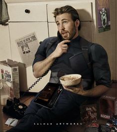 a man sitting on the floor with a bowl of cereal in front of his face