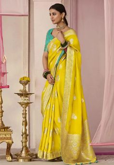 Yellow viscose saree with blouse 282 Desc: Color : Yellow Fabric : Silk Viscose Wash Care : Dry clean Sleeve Style : Half Sleeve Long Sleeves : Done only in Custom Stitch Sleeves Lining : Done only in Custom Stitch Bust Size : 32 to 42 Inches Occasion : Festival Diwali Ceremonial Gudi Padwa Vat Purnima Raksha Bandhan Karwa Chauth. With Express Free Shipping Buy Designer Sarees - Indian Party wedding and bridal Yellow viscose saree with blouse 282 online in USA, UK and Canada ... Yellow Blouse Design, Saree Matching Blouse, Lemon Yellow Blouse, Mustard Yellow Saree, Drapping Saree, Designer Silk Sarees, Yellow Saree, Ghagra Choli, Party Kleidung