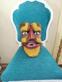 "This is a beautiful mask of the dance of the \"Moros Chinos\", originally from the municipality of Zitlala in the state of Guerrero, it is large in size. It is a beautiful mask made of wood that has a red face, has incredible eyebrows carved in the wood in an \"L\" shape, it also has a beard and lines in the shape of an \"I\" on the sides of the cheek that they are yellow. You can see the age and use of the mask on the back, it also has some pieces of brown plush fabric on top of the mask. This Traditional Masks And Prosthetics For Carnival, Traditional Full Face Carnival Masks, Traditional Masks And Prosthetics For Festivals, Traditional Carnival Masks And Prosthetics, Traditional Festival Masks And Prosthetics, Handmade Traditional Mask, Devil Mask, Red Face, Beautiful Mask