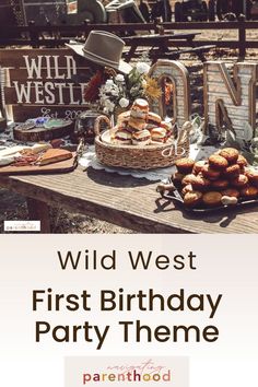 wild west first birthday party theme with desserts on the table and sign that reads wild west first birthday party theme