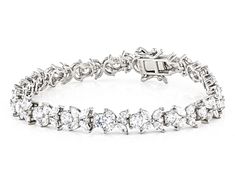 Bella Luce® white diamond simulant 15.86ctw round and marquise, platinum over sterling silver tennis bracelet. Measures approximately 7.25"-8" L x 0.25" W and has a hidden box clasp closure. Diamond equivalent weight is 9.61ctw. Silver Marquise Tennis Bracelet Fine Jewelry, Silver Marquise Diamond Bracelet For Anniversary, Silver Marquise Jubilee Tennis Bracelet, Silver Marquise Diamond Bracelet With Prong Setting, Marquise Cut Cubic Zirconia Tennis Bracelet As Gift, Silver Tennis Bracelet, Diamond Simulant, Box Clasp, Tennis Bracelet