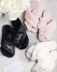 three personalized slippers and a bouquet of flowers