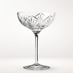 an empty wine glass on a white background