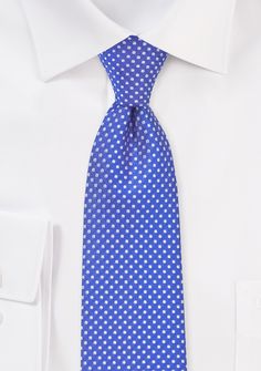 The Horizon Pin Dot Necktie is a versatile accessory that can complement a variety of suits. This tie looks particularly good when paired with a navy or dark grey suit, making it a great choice for formal occasions like weddings and black-tie events. If you're shopping for suits or tuxedos, consider adding this necktie to your collection for a pop of color and classic style. Elegant Polka Dot Ties, Elegant Polka Dot Tie For Black Tie Events, Polka Dot Standard Tie For Business, Polka Dot Ties For Black Tie Events, Polka Dot Ties For Black Tie Occasions, Polka Dot Standard Tie For Formal Occasions, Formal Polka Dot Standard Tie, Dark Grey Suit, Dark Gray Suit