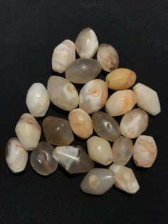 A beautiful string of Bended white agate natural found from Afghanistan dating 1800 yrs. They are found at that time in Afghanistan mostly but also some found in India and Pakistan too. They were used as a special charm jewellery by the affluents at that time period. Beautiful counter bronze are decorated further in between the beads. White Natural Stones Beads For Healing, Natural Stone Oval Beads Amulet, Natural Stone Oval Amulet Beads, Agate Amulet Beads For Jewelry Making, Spiritual Faceted Agate Beads, White Gemstone Beads For Jewelry Making, White Agate Jewelry With Polished Beads, White Polished Beads Gems And Cabochons For Gifts, Handmade White Agate Beads