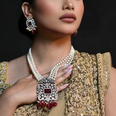 Timeless elegance with a touch of tradition. Our pearl and polki set adorned with semi-precious stones accents is perfect for making a regal statement. Embrace the heritage with Shivanshri’s exquisite collection. ✨👑 #RoyalElegance #TimelessBeauty #ShivanshriJewels#shivanshri#luxuryjewelry #viralreels#viral