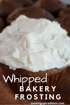 a close up of a cupcake with frosting on it and the words whipped bakery frosting