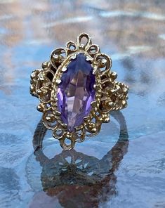 ~ Vintage, 14K Gold, Victorian Amethyst Ring. Ring Size 7, Weighs Approximately 6.57 Grams On My Scale. This Exquisite Victorian Ring Is Even More Stunning In Person. With A Large 12mm Amethyst Stone In The Middle. In Excellent Condition. ~ Due To The Unique Nature Of Antiques & Vintage Items, They Are Being Sold As Is. Please Keep In Mind, That Most Of All Antiques & Vintage Items Will Show Wear & Imperfections Consistent With Their Age And Use. Please Look At The Pictures Provided Pink Gemstones Ring, Victorian Ring, Birthstone Colors, Victorian Rings, Amethyst Gem, Unique Nature, Purple Band, Pink Gemstones, Size 10 Rings