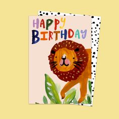 a happy birthday card with a lion on it