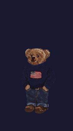 a teddy bear wearing a sweater and jeans