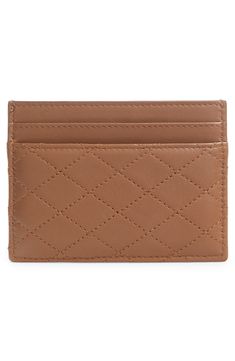 Diamond-quilted accents texture a lambskin-leather card case with antiqued YSL hardware and a center pocket for securing cash. Center slip pocket; four card slots Leather Made in Italy Designer Handbags Designer Quilted Rectangular Wallet, Classic Formal Quilted Wallet, Quilted Leather Wallets For Formal Occasions, Classic Quilted Wallet For Everyday Use, Classic Quilted Wallet, Formal Quilted Leather Wallets, Classic Quilted Rectangular Wallet, Designer Leather Wallet With Quilted Detail, Designer Quilted Leather Wallet