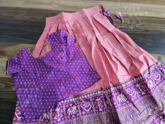 This Lehenga suits 6 yr - 7 yr. Kindly please contact us if needed measurements before purchase. Designer Cotton Silk Sets For Navratri, Fitted Handloom Anarkali Set For Diwali, Cotton Silk Sets With Traditional Drape For Festivals, Designer Wear Pink Handloom Lehenga, Designer Handloom Pink Lehenga, Fitted Art Silk Sets With Traditional Patterns, Festive Cotton Silk Sets With Traditional Drape, Designer Pink Handloom Lehenga, Traditional Drape Sets With Traditional Patterns