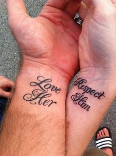 two people holding hands with tattoos on their wrists that say love her and respect him