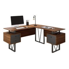 a computer desk with two drawers and a monitor