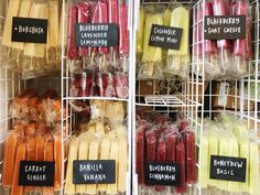 many different types of food are on display in the store, including carrots and celery