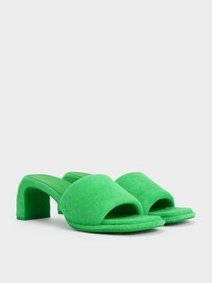 Loey Textured Curved-Heel Mules Green High Heel Mules For Summer, Trendy Green Block Heel Sandals, Summer Green Open Heel Mules, Green Open Toe Mules For Spring, Green Open Heel Mules For Summer, Green Synthetic Casual Mules, Trendy Green Mules With Padded Heel, Green Open Heel Mules For Party, Trendy Green Open Toe Mules