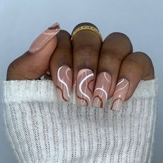 Simplify your beauty routine with the Toasted Press On Nail Set. This fun neutral, brown swirl nail art design has professional-grade adhesive for a quick but luxurious nail look. Achieve a sophisticated, modern, and put-together appearance in minutes. Neutral Press On Nails, Beige Swirl Nails, Nude Swirl Nail Designs, Swirl Nail Art Designs, Brown Girl Nails, Brown Swirl Nails, Nails Suggestions, Short Square Nail Art, Maddy Nails