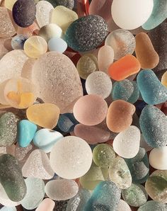 many different colored rocks and pebbles together