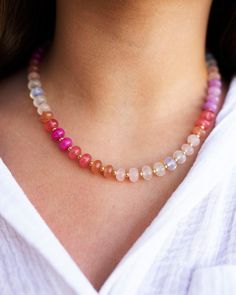 Introducing our breathtaking "Blushed" gemstone necklace--a piece that beautifully harmonizes soft, muted pinks with vibrant pops of colorful gemstones.  Each gemstone is separated by dainty 3mm gold-filled beads, adding a touch of elegance to this stunning piece. Perfect for elevating any outfit, this necklace is a must-have for your jewelry collection!   *Gemstones: Jade & Quartz  *Bead size - 6,8mm Rondelle *Mechanism - Gold Filled Lobster Clasp with option of added 3" gold filled chain extender. Adjustable Pink Gemstone Beaded Necklace, Adjustable Pink Gemstone Beaded Necklaces, Adjustable Pink Crystal Necklace With Natural Stones, Pink Crystal Necklace With Natural Stones, Adjustable Pink Gemstone Beads Necklace, Adjustable Pink Necklace With Gemstone Beads, Pink Faceted Beads Necklace For Healing, Pink Crystal Necklaces With Round Gemstone Beads, Pink Crystal Necklaces With Round Beads