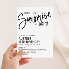 someone holding up a birthday party card with the words surprise party written in black on it