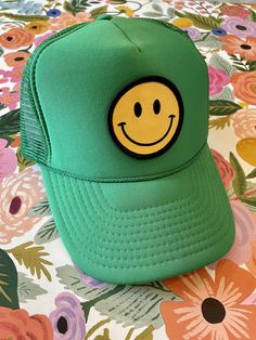 Our Smiley Face Trucker Hat is sure to bring a smile to everyone you pass by. Adjustable--one size fits most, comfortable, and breathable. Colors marked sold out are being restocked as quickly as possible. Keep smiling! Colors in order in 2nd photo: black, fuschia, neon pink, light pink, neon green, green, sand, blue, turquoise, light blue, white :) Fun Adjustable Brimmed Trucker Hat, Cute Brimmed Trucker Hat, One Size Fits Most, Cute Brimmed Trucker Hat One Size Fits Most, Cute Brimmed Trucker Hat, Fun Trucker Hat With Curved Brim, Cute Green Cap Hat, Adjustable Smiley Face Cap, Fun Curved Brim Hat One Size, Green Fun Snapback Trucker Hat