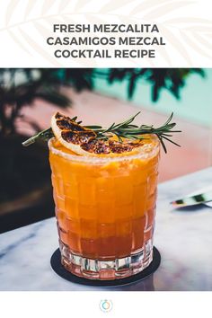 an orange cocktail with rosemary garnish on the rim and text that reads fresh mezcalita casamios mezcala cocktail recipe