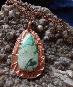 Created from  copper metal clay, this one of a kind pendant is a great spring to summer pendant due to the lovely shades of green that the variscite showcases.  The abstract line detail of the texture that was hand drawn adds to the uneven shape of both the stone and the metal backing itself.  The pendant was placed on an over-sized bail and hangs on a 24 inch antique copper rolo chain. Variscite is a stone of serenity that balances and promotes courage and universal love.  It has a soothing nat Unique Green Patina Necklaces, Unique Green Patina Jewelry, Handmade Chrysoprase Necklaces In Nature Style, Unique Green Jewelry With Patina, Green Electroformed Bohemian Jewelry, Green Bohemian Electroformed Jewelry, Bohemian Green Electroformed Jewelry, Green Chrysocolla Necklace With Large Pendant, Hand Forged Green Bohemian Necklace