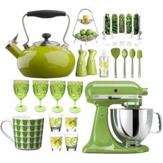 a green kitchen set with cups and utensils