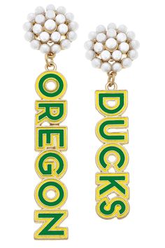 Accessorize your game day look with these University of Oregon drop earrings. The “DUCKS” earrings are perfect for making a statement while showing off your team spirit with pearl embellishments and block letters! Block Letters, University Of Oregon, Pearl Cluster, Oregon Ducks, Enamel Earrings, Block Lettering, Team Spirit, Ducks, Green Yellow