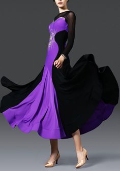 a woman in a purple and black dress