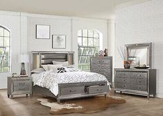 a bedroom scene with focus on the bed, dresser and nightstands in grey color