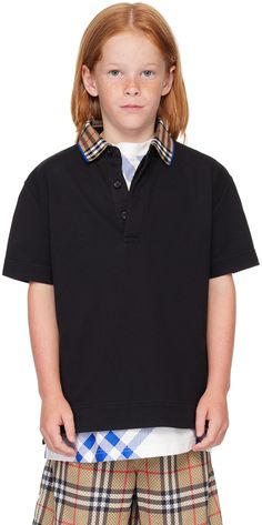 Organic cotton piqué polo. · Check pattern at knit spread collar · Three-button placket · Logo embroidered at front · Tennis-tail hem · Machine-wash Supplier color: Black Model measures 48 / 121.9 cm tall and wears size 8Y. Burberry Size: child's height 3Y: 38.5 / 98 cm 4Y: 41 / 104 cm 6Y: 45.5 / 115.5 cm 8Y: 50.4 / 128 cm 10Y: 55.1 / 140 cm 12Y: 59.9 / 152 cm 14Y: 64.6 / 164 cm Classic Cotton Polo Sweater With Striped Collar, Black Cotton Polo Shirt With Striped Collar, Classic Short Sleeve Polo Sweater With Striped Collar, Black Cotton Polo Sweater With Ribbed Collar, Black Polo Shirt With Striped Collar, Casual Black Polo Sweater With Striped Collar, Black Polo Tops With Contrast Collar, Classic Black Tops With Contrast Collar, Classic Black Polo Shirt With Striped Collar