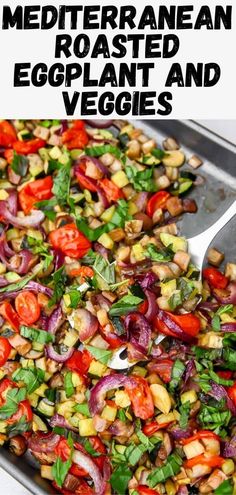 a tray filled with vegetables on top of a table